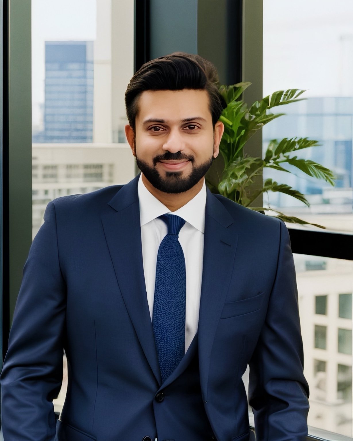 Asif Tourab in a blue suit